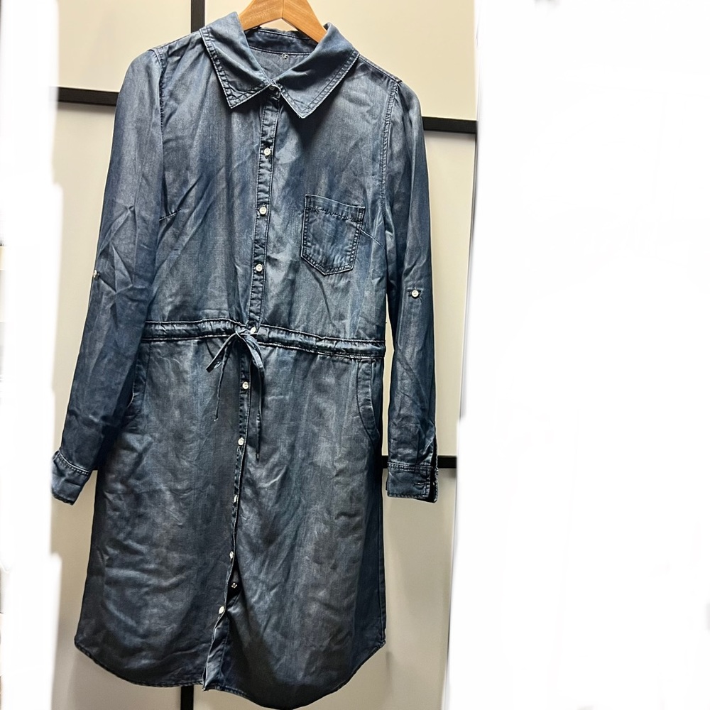 Shirt dress, it has a snap in between the buttons.